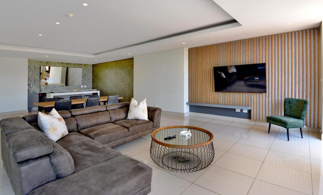 The Houghton Hotel, Spa, Wellness & Golf Johannesburg Exterior photo The interior of a penthouse at the 1221 Olympic Boulevard building.