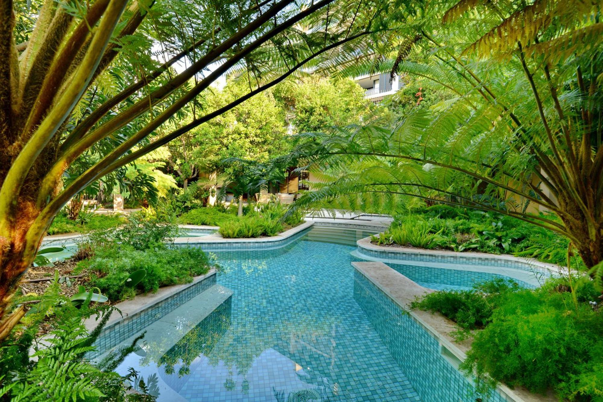 The Houghton Hotel, Spa, Wellness & Golf Johannesburg Exterior photo The pool at the hotel
